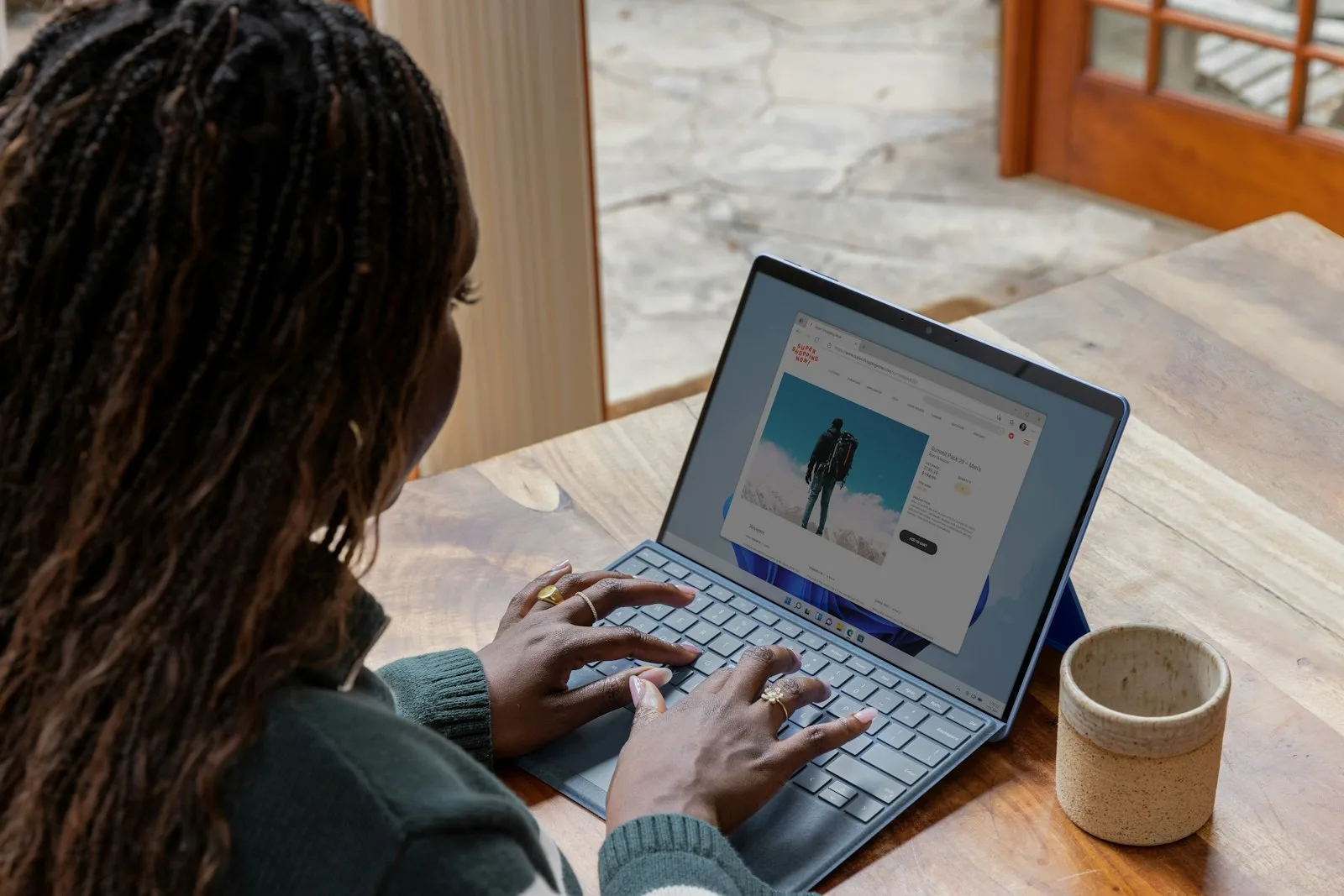A young lady doing blogging as a part of her freelancing work
