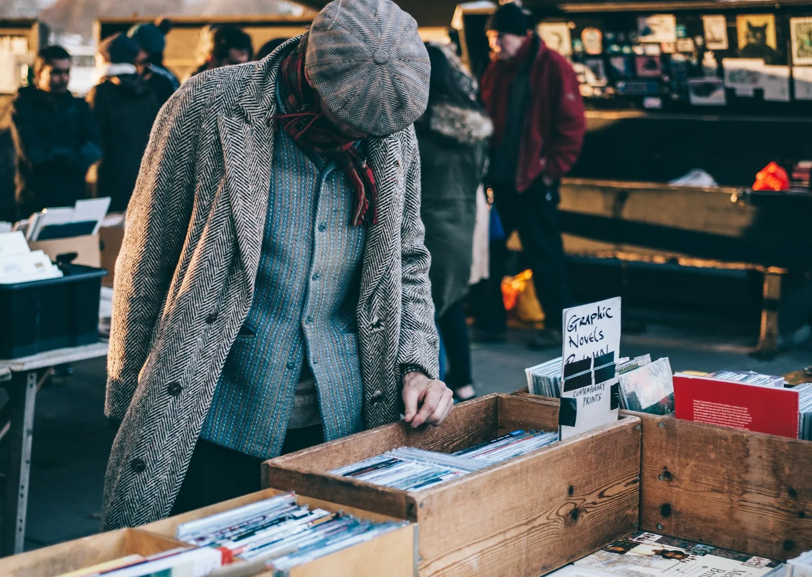Image of a person carefully browsing through the list of things and evaluating before purchasing something. A sign of mindful purchase.
