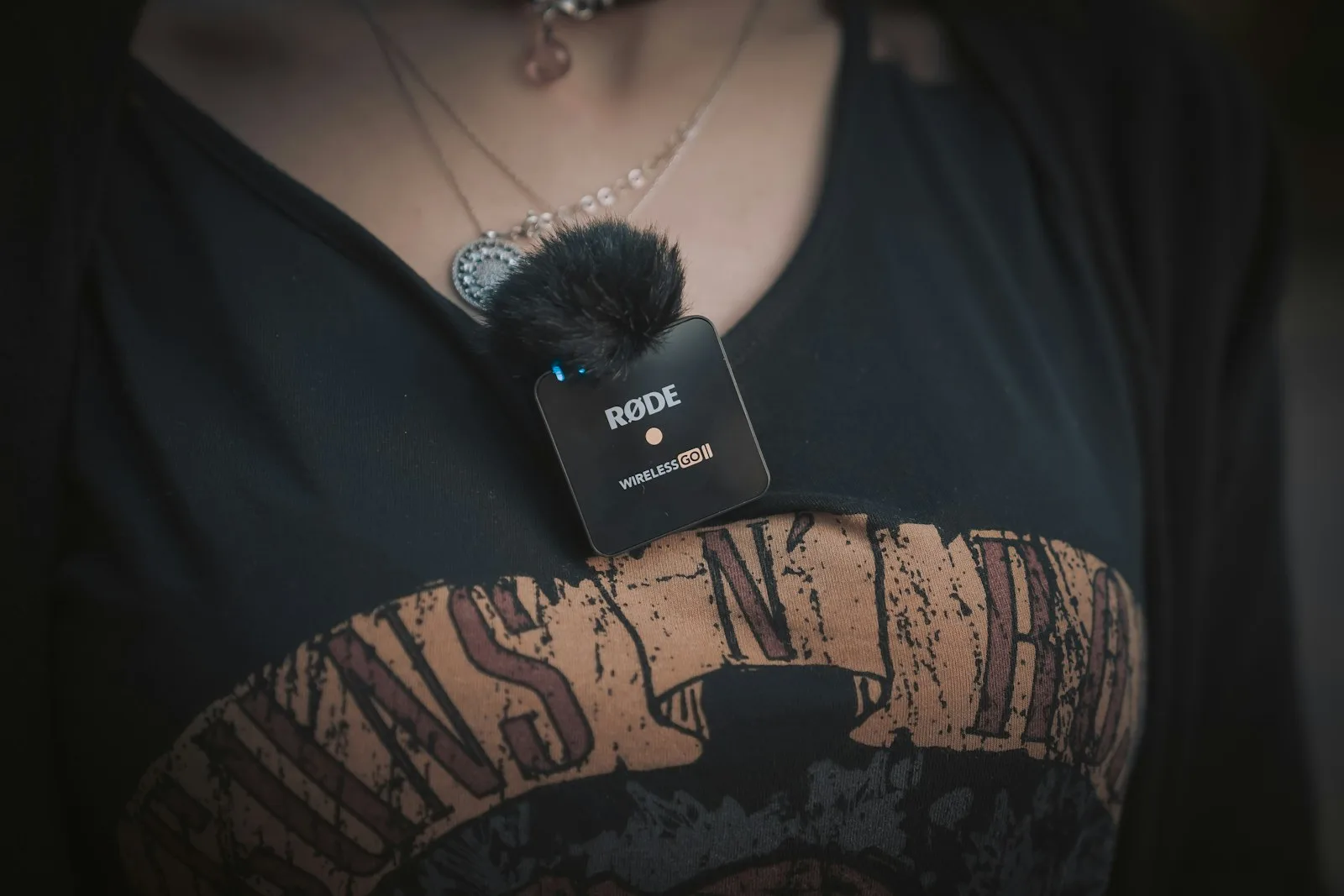 Photo of a person recording conversation using a portable microphone