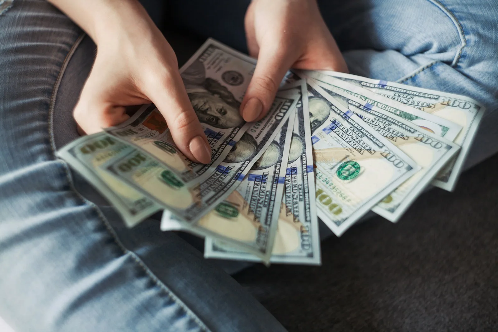 A handful of hundred dollar bills
