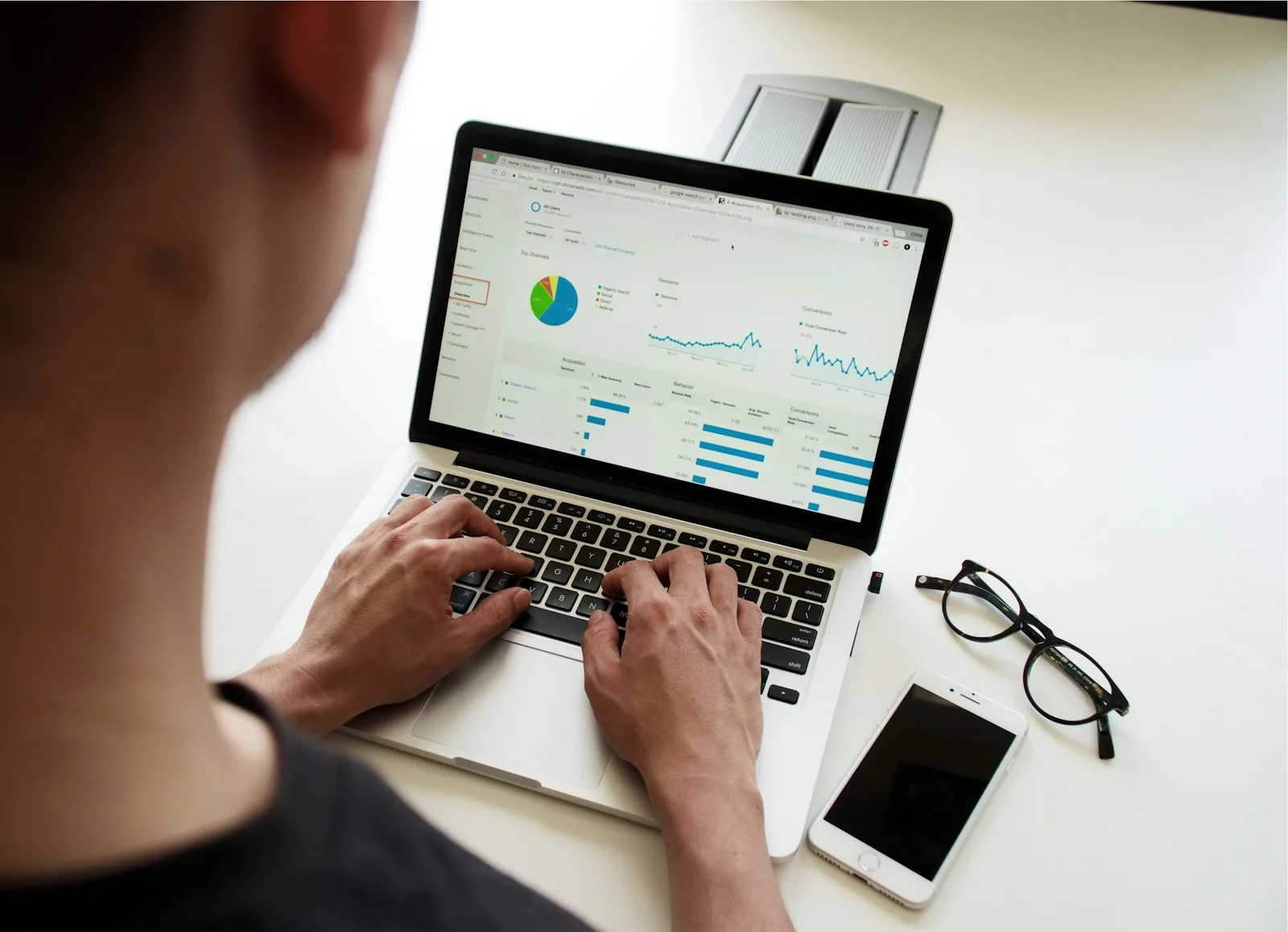Photo of a person checking their credit report on their laptop