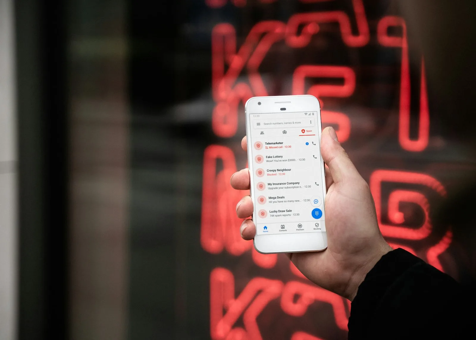 Photo of a mobile phone showing multiple spam calls that have been rejected. A lot of financial scams in today’s world happen through spammy calls.