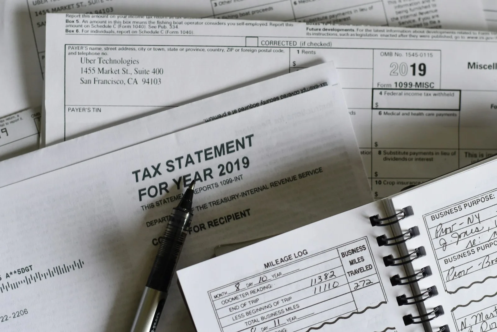 A person going through all the tax credit documents to maximize it.
