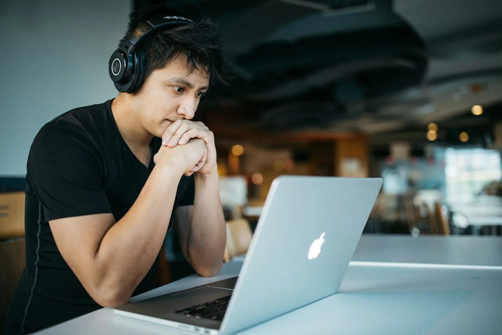 Image of a person going through an online course on his laptop