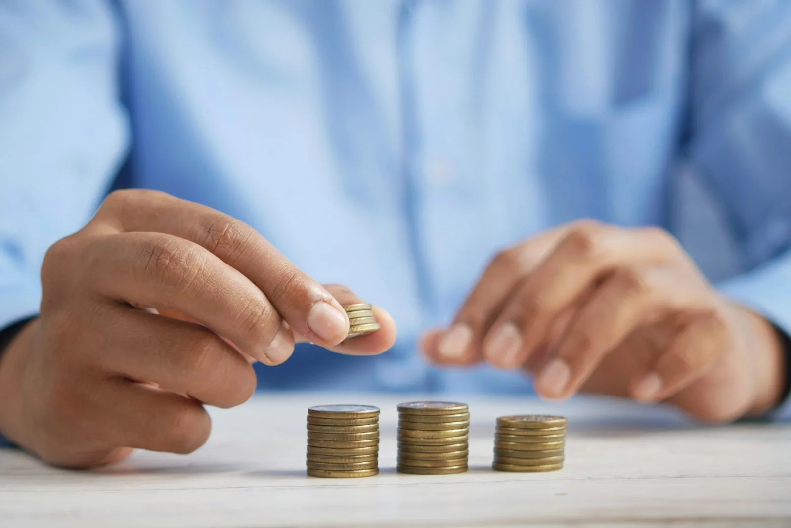 A man counting coins