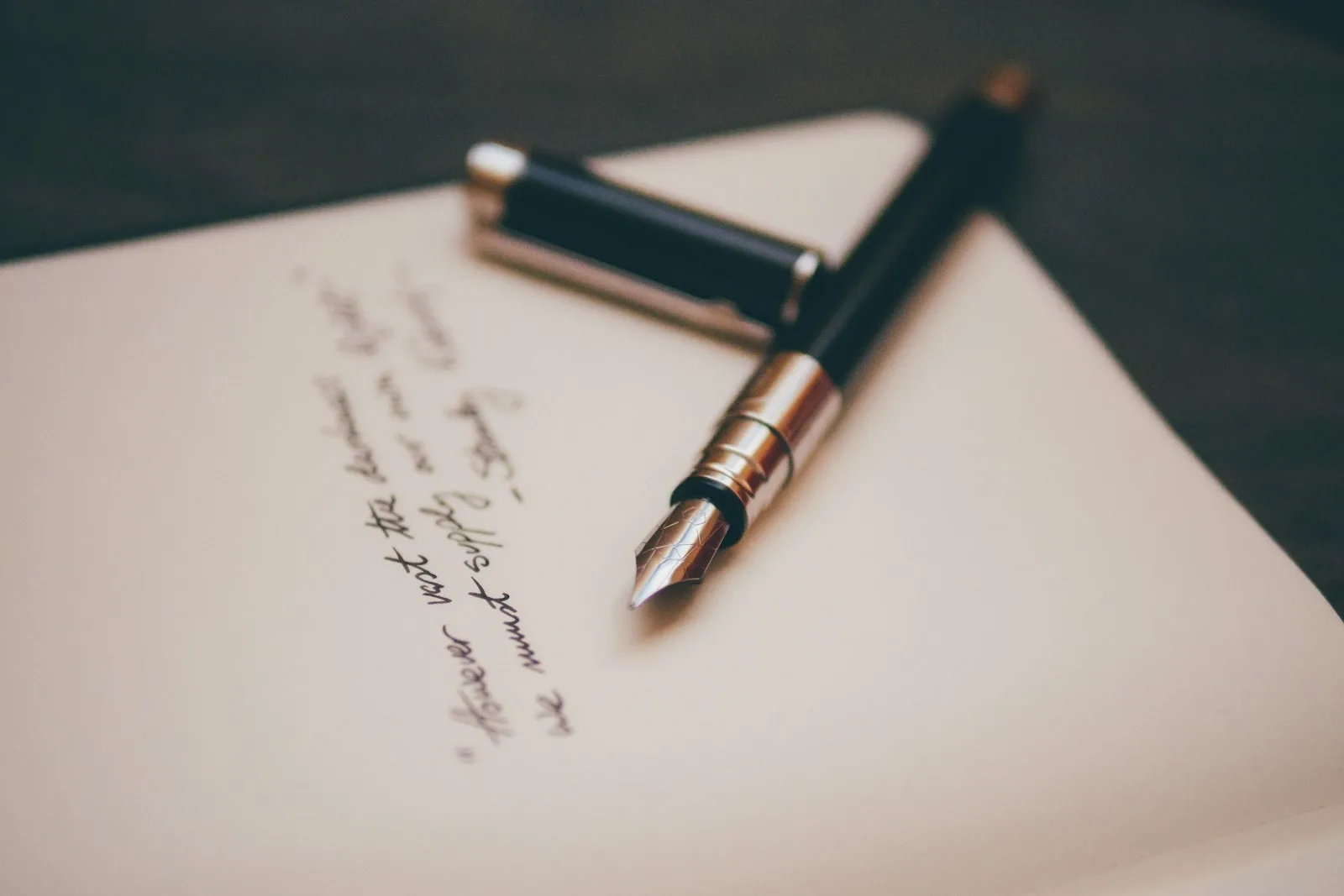 Photo of a will with a pen on top of it