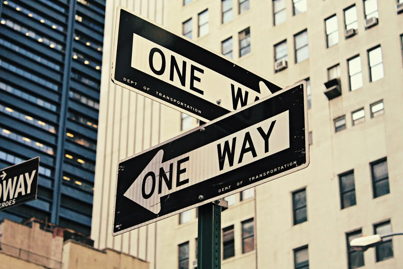 Road signs showing two different ways that a person can take