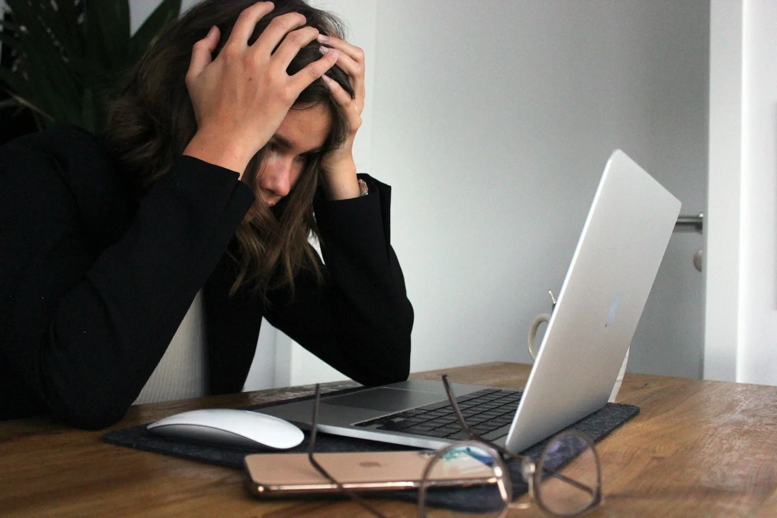 A person looking stressed due to her financial situation